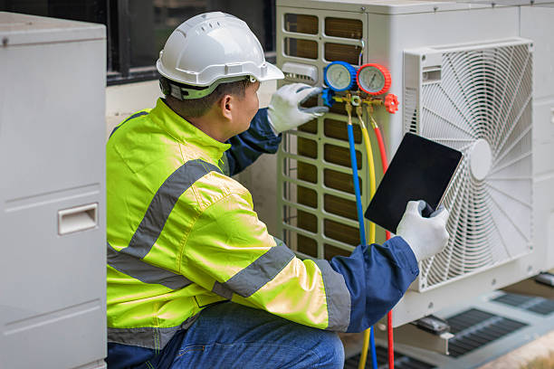 Professional Hvac Maintenance technician working in Norwell, MA